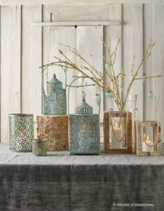 Ornate metal and wooden candle holders