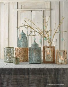 Ornate metal and wooden candle holders