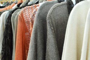 Ladies knitwear hanging on a rail