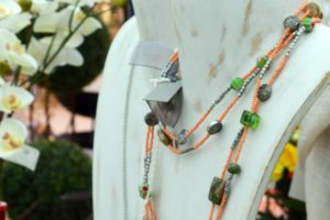 Orange necklace with green beads
