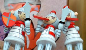 Brightly painted wooden toy soldiers